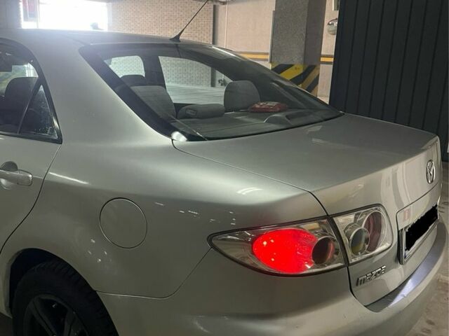 Серый Мазда 6, объемом двигателя 2 л и пробегом 203 тыс. км за 4800 $, фото 4 на Automoto.ua