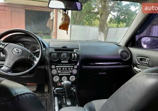 Серый Мазда 6, объемом двигателя 2 л и пробегом 320 тыс. км за 5000 $, фото 2 на Automoto.ua