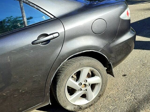 Серый Мазда 6, объемом двигателя 1.8 л и пробегом 408 тыс. км за 4800 $, фото 3 на Automoto.ua