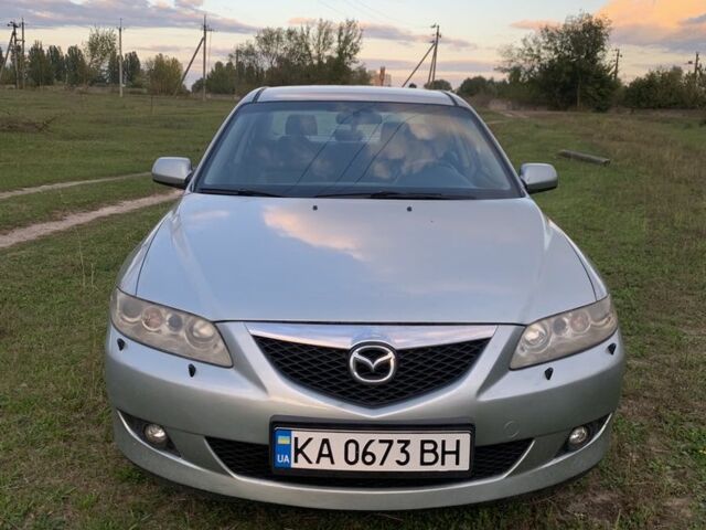 Серый Мазда 6, объемом двигателя 2 л и пробегом 412 тыс. км за 4000 $, фото 2 на Automoto.ua
