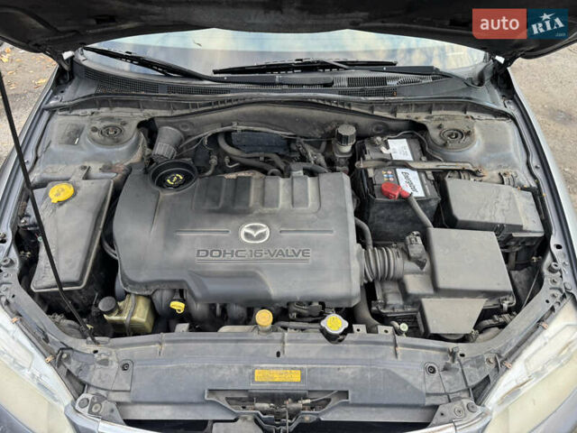 Сірий Мазда 6, об'ємом двигуна 2 л та пробігом 244 тис. км за 4000 $, фото 9 на Automoto.ua
