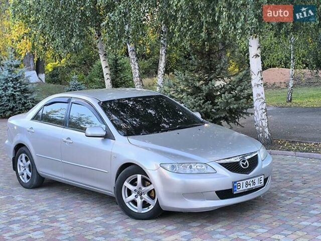 Серый Мазда 6, объемом двигателя 2 л и пробегом 243 тыс. км за 3900 $, фото 25 на Automoto.ua