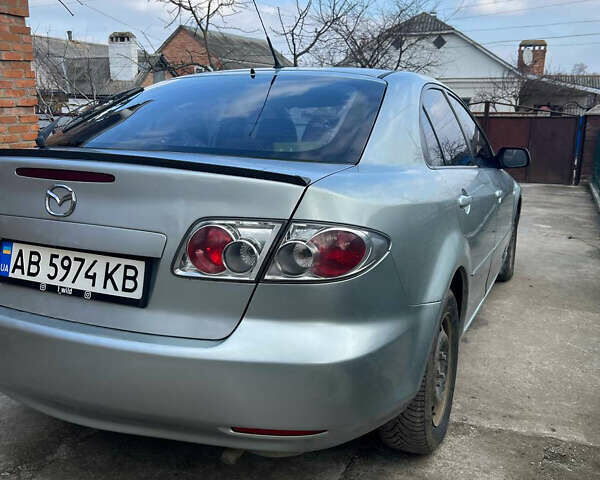 Сірий Мазда 6, об'ємом двигуна 2 л та пробігом 333 тис. км за 4300 $, фото 2 на Automoto.ua