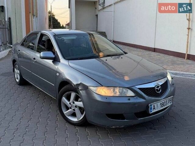 Серый Мазда 6, объемом двигателя 2 л и пробегом 338 тыс. км за 1950 $, фото 1 на Automoto.ua