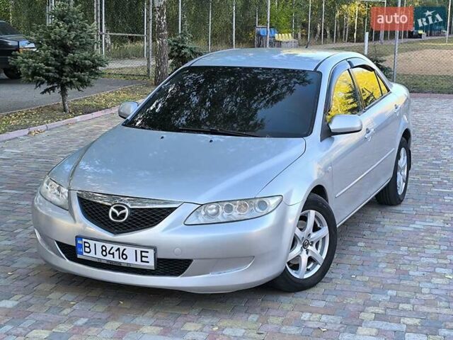 Серый Мазда 6, объемом двигателя 2 л и пробегом 243 тыс. км за 3900 $, фото 4 на Automoto.ua