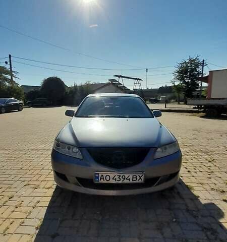Серый Мазда 6, объемом двигателя 2 л и пробегом 320 тыс. км за 5000 $, фото 1 на Automoto.ua