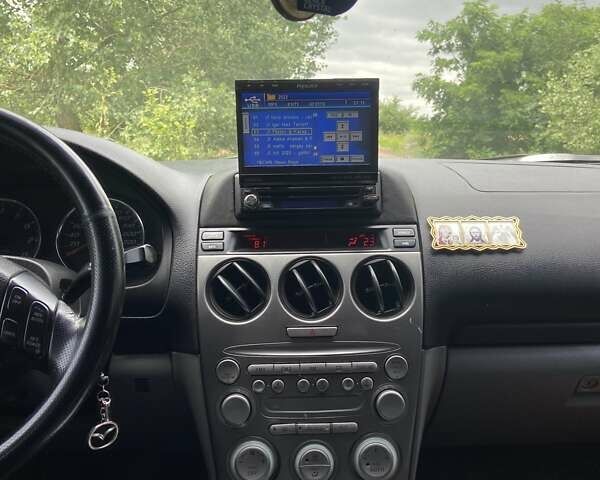 Серый Мазда 6, объемом двигателя 2 л и пробегом 235 тыс. км за 3900 $, фото 5 на Automoto.ua
