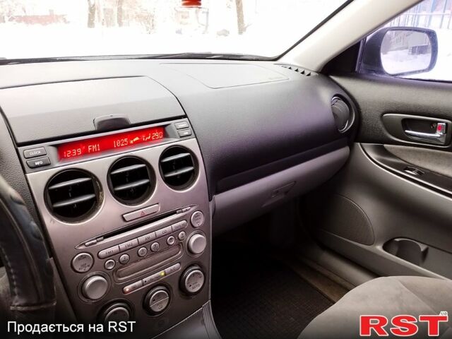 Серый Мазда 6, объемом двигателя 2 л и пробегом 218 тыс. км за 4000 $, фото 9 на Automoto.ua
