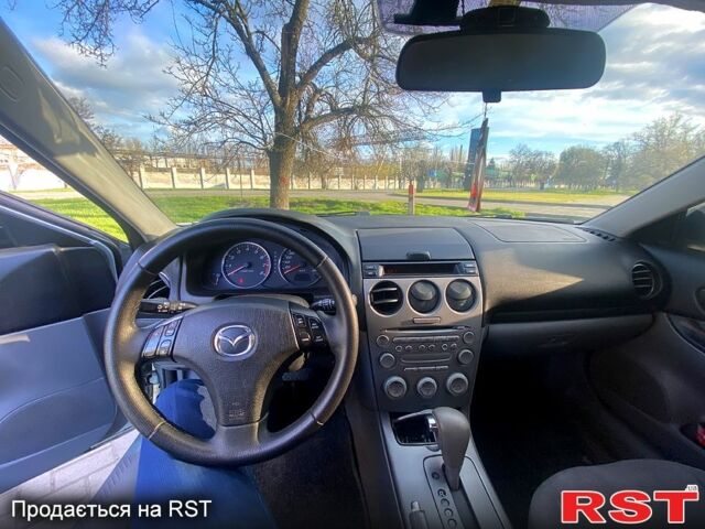 Серый Мазда 6, объемом двигателя 2 л и пробегом 245 тыс. км за 3999 $, фото 4 на Automoto.ua
