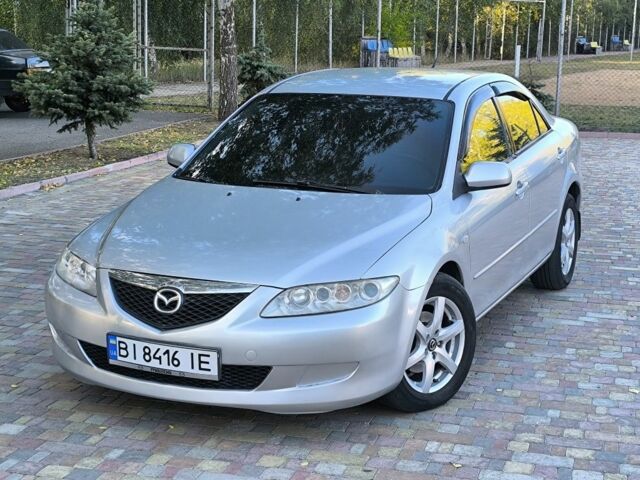 Серый Мазда 6, объемом двигателя 2 л и пробегом 243 тыс. км за 3900 $, фото 2 на Automoto.ua