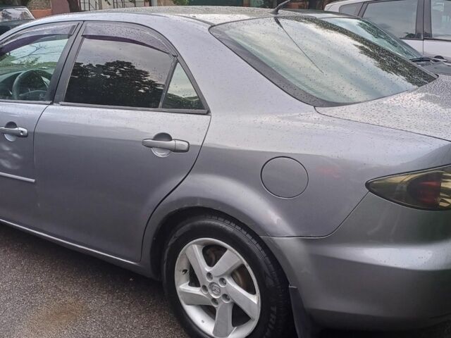 Серый Мазда 6, объемом двигателя 2 л и пробегом 320 тыс. км за 3000 $, фото 2 на Automoto.ua