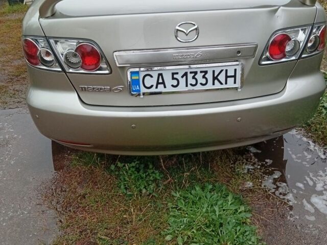 Серый Мазда 6, объемом двигателя 2 л и пробегом 215 тыс. км за 3800 $, фото 6 на Automoto.ua