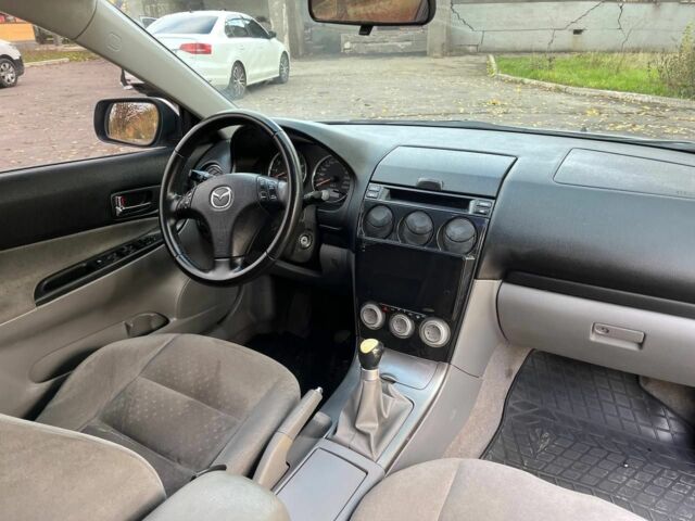 Серый Мазда 6, объемом двигателя 2 л и пробегом 255 тыс. км за 4500 $, фото 6 на Automoto.ua