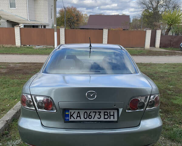 Серый Мазда 6, объемом двигателя 2 л и пробегом 412 тыс. км за 3700 $, фото 1 на Automoto.ua