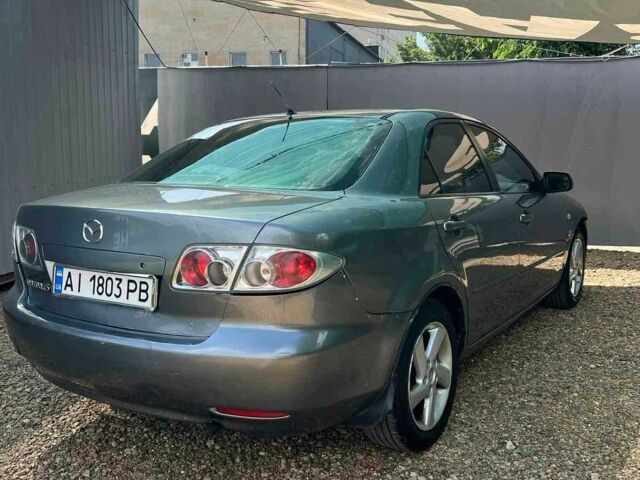 Серый Мазда 6, объемом двигателя 2 л и пробегом 272 тыс. км за 2600 $, фото 2 на Automoto.ua