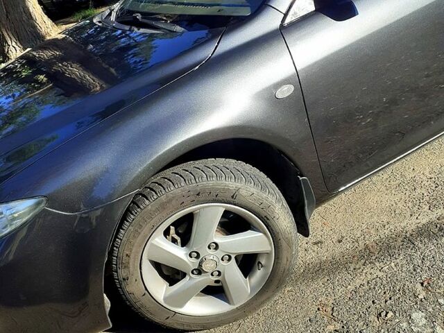 Серый Мазда 6, объемом двигателя 1.8 л и пробегом 408 тыс. км за 4800 $, фото 4 на Automoto.ua