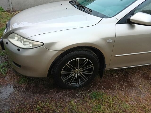 Серый Мазда 6, объемом двигателя 2 л и пробегом 215 тыс. км за 3800 $, фото 1 на Automoto.ua