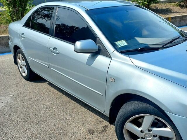 Сірий Мазда 6, об'ємом двигуна 2 л та пробігом 318 тис. км за 4950 $, фото 8 на Automoto.ua