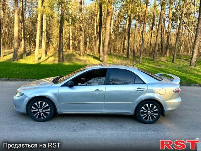 Сірий Мазда 6, об'ємом двигуна 2 л та пробігом 250 тис. км за 3199 $, фото 4 на Automoto.ua