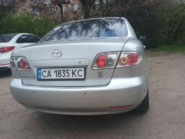 Серый Мазда 6, объемом двигателя 2 л и пробегом 232 тыс. км за 3200 $, фото 3 на Automoto.ua