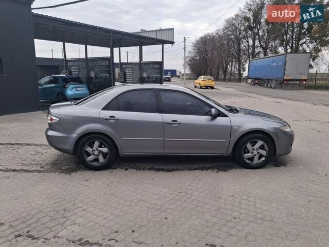 Сірий Мазда 6, об'ємом двигуна 2 л та пробігом 265 тис. км за 2999 $, фото 5 на Automoto.ua