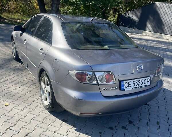 Сірий Мазда 6, об'ємом двигуна 2 л та пробігом 350 тис. км за 3500 $, фото 3 на Automoto.ua