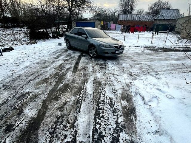 Серый Мазда 6, объемом двигателя 2 л и пробегом 150 тыс. км за 4700 $, фото 5 на Automoto.ua