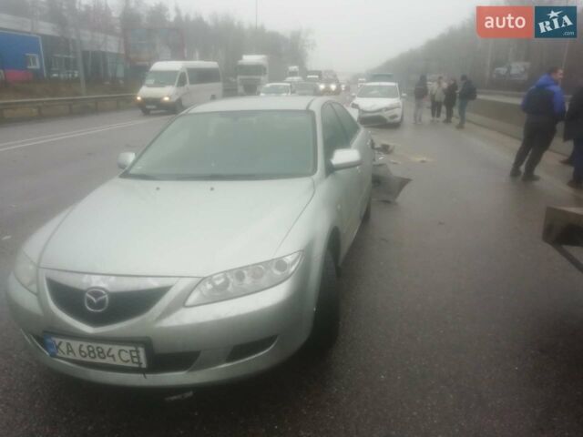 Сірий Мазда 6, об'ємом двигуна 2 л та пробігом 257 тис. км за 1750 $, фото 2 на Automoto.ua