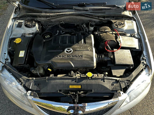 Серый Мазда 6, объемом двигателя 1.8 л и пробегом 233 тыс. км за 3400 $, фото 18 на Automoto.ua