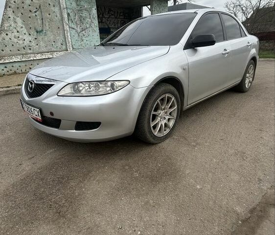 Серый Мазда 6, объемом двигателя 2 л и пробегом 250 тыс. км за 4300 $, фото 2 на Automoto.ua
