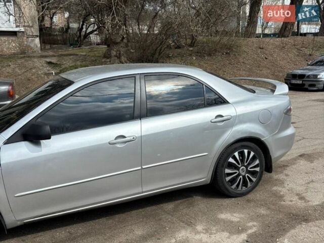 Серый Мазда 6, объемом двигателя 2 л и пробегом 330 тыс. км за 3200 $, фото 2 на Automoto.ua