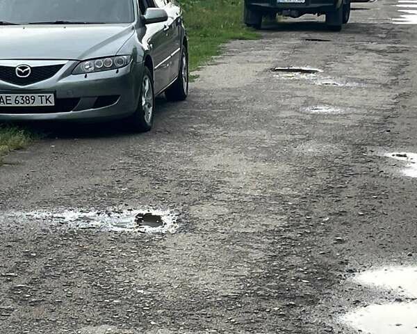 Сірий Мазда 6, об'ємом двигуна 2 л та пробігом 230 тис. км за 4700 $, фото 1 на Automoto.ua