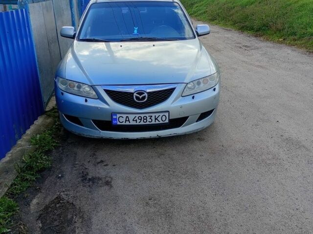 Серый Мазда 6, объемом двигателя 2 л и пробегом 273 тыс. км за 3500 $, фото 1 на Automoto.ua