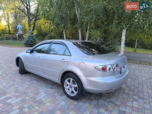 Серый Мазда 6, объемом двигателя 2 л и пробегом 243 тыс. км за 3900 $, фото 6 на Automoto.ua