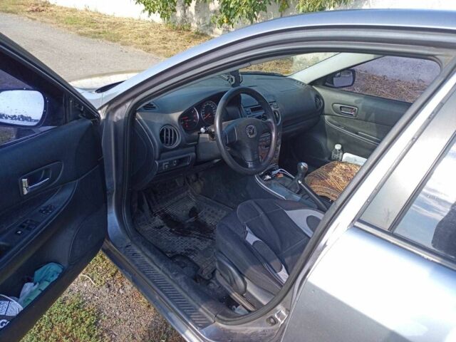 Серый Мазда 6, объемом двигателя 2 л и пробегом 112 тыс. км за 3300 $, фото 4 на Automoto.ua