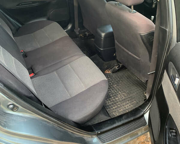 Серый Мазда 6, объемом двигателя 2 л и пробегом 360 тыс. км за 2900 $, фото 4 на Automoto.ua