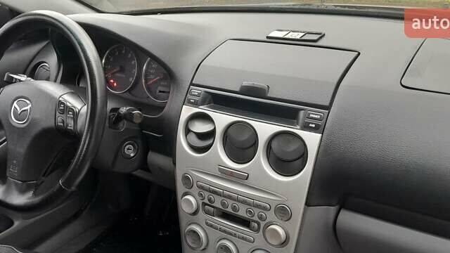 Серый Мазда 6, объемом двигателя 1.8 л и пробегом 290 тыс. км за 3500 $, фото 1 на Automoto.ua