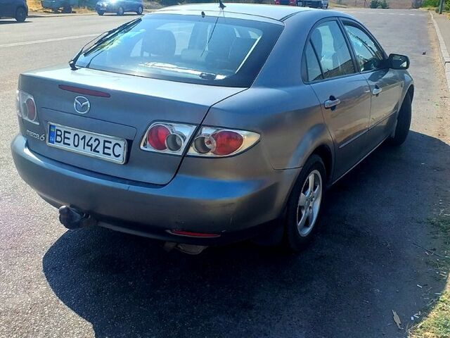 Серый Мазда 6, объемом двигателя 1.8 л и пробегом 320 тыс. км за 3600 $, фото 1 на Automoto.ua