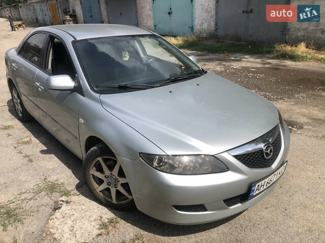 Серый Мазда 6, объемом двигателя 2 л и пробегом 290 тыс. км за 3900 $, фото 1 на Automoto.ua