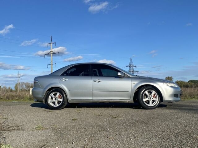 Сірий Мазда 6, об'ємом двигуна 2 л та пробігом 310 тис. км за 4000 $, фото 2 на Automoto.ua