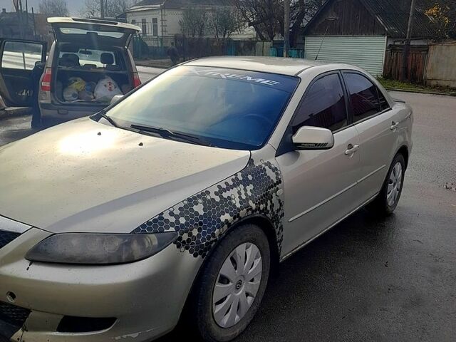 Сірий Мазда 6, об'ємом двигуна 2 л та пробігом 380 тис. км за 2900 $, фото 1 на Automoto.ua