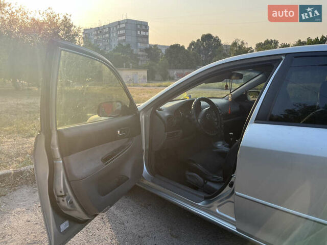 Серый Мазда 6, объемом двигателя 2 л и пробегом 330 тыс. км за 3800 $, фото 4 на Automoto.ua