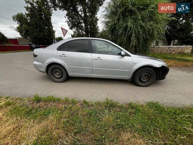Серый Мазда 6, объемом двигателя 2 л и пробегом 275 тыс. км за 3800 $, фото 5 на Automoto.ua