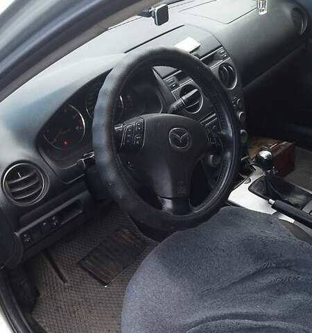 Серый Мазда 6, объемом двигателя 2 л и пробегом 200 тыс. км за 5000 $, фото 1 на Automoto.ua