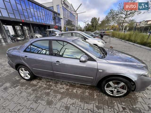 Серый Мазда 6, объемом двигателя 2 л и пробегом 388 тыс. км за 3650 $, фото 4 на Automoto.ua