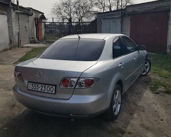 Серый Мазда 6, объемом двигателя 2 л и пробегом 206 тыс. км за 4300 $, фото 2 на Automoto.ua