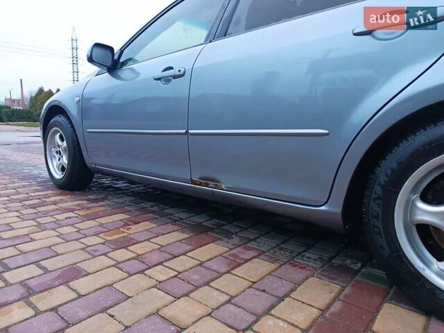 Серый Мазда 6, объемом двигателя 2 л и пробегом 302 тыс. км за 3800 $, фото 3 на Automoto.ua