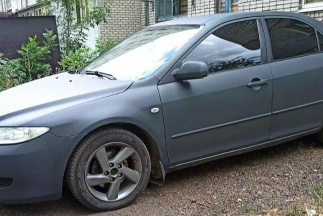 Серый Мазда 6, объемом двигателя 2 л и пробегом 335 тыс. км за 3863 $, фото 1 на Automoto.ua