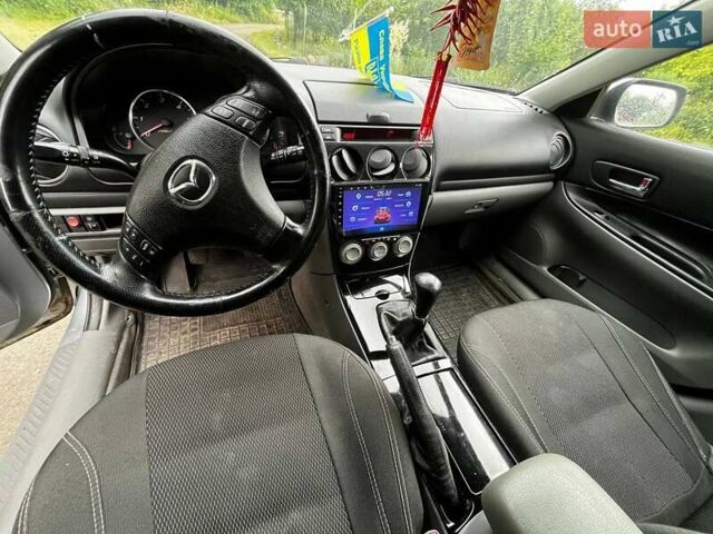 Серый Мазда 6, объемом двигателя 2 л и пробегом 275 тыс. км за 3800 $, фото 8 на Automoto.ua