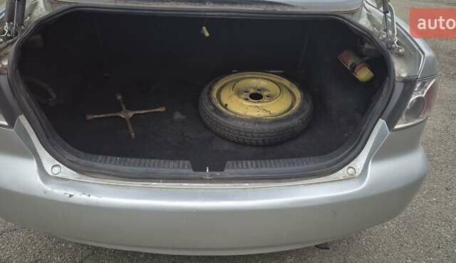 Серый Мазда 6, объемом двигателя 2 л и пробегом 239 тыс. км за 2700 $, фото 2 на Automoto.ua